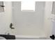The bathroom features white tile and a shower and tub combo at 2665 Northview Ave, Decatur, GA 30032