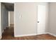 Cozy bedroom featuring warm hardwood floors, neutral paint, and a modern ceiling light at 2665 Northview Ave, Decatur, GA 30032