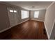 Charming living room featuring original hardwood flooring, freshly painted walls, and abundant natural light at 2665 Northview Ave, Decatur, GA 30032
