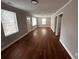 Bright living room with hardwood floors, neutral paint, and large windows allowing natural light at 2665 Northview Ave, Decatur, GA 30032