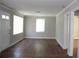 Inviting living room with hardwood floors, fresh neutral paint, and large windows for ample natural light at 2665 Northview Ave, Decatur, GA 30032