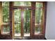 Inviting balcony view framed by brick walls and wood trim windows at 319 Atlanta Se St # 317, Marietta, GA 30060