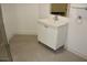This bathroom includes a white vanity with modern chrome fixtures at 319 Atlanta Se St # 317, Marietta, GA 30060