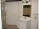 Bathroom featuring a white vanity with sink and a glass-door shower at 319 Atlanta Se St # 317, Marietta, GA 30060