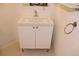 Bright bathroom featuring a single sink vanity with white cabinets and chrome hardware at 319 Atlanta Se St # 317, Marietta, GA 30060