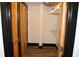 Spacious walk-in closet with wooden louvered doors and built-in shelving at 319 Atlanta Se St # 317, Marietta, GA 30060