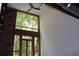 Spacious living area with high ceilings and large windows showcasing leafy views at 319 Atlanta Se St # 317, Marietta, GA 30060