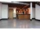 Open floor plan with concrete floors, exposed ductwork and kitchen island at 319 Atlanta Se St # 317, Marietta, GA 30060