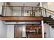Stylish living area featuring a loft, exposed ductwork, and modern staircase at 319 Atlanta Se St # 317, Marietta, GA 30060