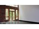 Bright living space featuring a door to a balcony overlooking trees at 319 Atlanta Se St # 317, Marietta, GA 30060