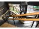 Stylish stairway with wooden handrails and black metal railings for contemporary look at 319 Atlanta Se St # 317, Marietta, GA 30060