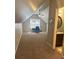 Upstairs bonus room features office area and access to an en-suite bathroom with vanity at 325 Brook Hollow Ln, Loganville, GA 30052