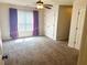 Bedroom with carpet, ceiling fan and natural light at 325 Brook Hollow Ln, Loganville, GA 30052