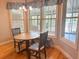Cozy breakfast nook with a round table, chairs, and bright natural light at 325 Brook Hollow Ln, Loganville, GA 30052