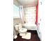 Cozy bathroom featuring a shower-tub combination with stylish tiles and a bright window at 579 Wexwood Dr, Riverdale, GA 30274