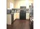 Functional kitchen with stainless steel appliances, sleek countertops, and ample cabinet space for all your culinary needs at 579 Wexwood Dr, Riverdale, GA 30274