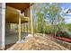 The back yard shows a patio area with exposed framing and exterior on the unfinished structure at 1430 Oconee Ne Pass, Brookhaven, GA 30319