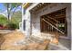 The exterior entrance features unfinished stairs and exposed framing on the side of a new home at 1430 Oconee Ne Pass, Brookhaven, GA 30319