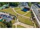 Aerial view of a well-maintained outdoor amphitheater and park space in a vibrant community with plenty of parking at 241 Haney Rd, Woodstock, GA 30188