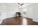 Bedroom featuring wood floors, ceiling fan, and natural light from the window at 241 Haney Rd, Woodstock, GA 30188