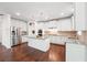 Spacious kitchen with stainless steel appliances, granite countertops, and an island, ideal for cooking at 241 Haney Rd, Woodstock, GA 30188