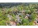 Expansive aerial view of beautiful homes nestled among lush, mature trees at 383 Indian Hills Trl, Marietta, GA 30068