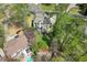 Aerial view of a home highlighting the backyard patio, landscaping, and neighborhood setting at 383 Indian Hills Trl, Marietta, GA 30068