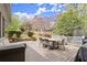 Backyard deck with outdoor seating, a dining table, and string lights, great for entertaining at 383 Indian Hills Trl, Marietta, GA 30068