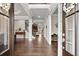 Welcoming foyer with hardwood floors and a view into the living spaces at 383 Indian Hills Trl, Marietta, GA 30068