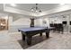 This finished basement offers a spacious game room with a ping pong table and a stylish bar area at 383 Indian Hills Trl, Marietta, GA 30068