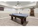 Finished basement with a game room featuring a ping pong table, ideal for recreation and fun at 383 Indian Hills Trl, Marietta, GA 30068