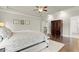 View of main bedroom with hardwood floors, wardrobe, and sitting area at 383 Indian Hills Trl, Marietta, GA 30068