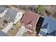 Aerial view of a beautiful home with a brown roof in a desirable neighborhood at 7130 Rocking Horse Ln, Cumming, GA 30040