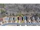Aerial view of a home showcasing its location in a peaceful neighborhood at 7130 Rocking Horse Ln, Cumming, GA 30040