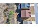 Home with a fenced yard situated near a stream, offering privacy and a connection to nature at 7130 Rocking Horse Ln, Cumming, GA 30040
