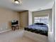 Bedroom with carpeted floors, and a beautiful window with bright natural light at 7130 Rocking Horse Ln, Cumming, GA 30040