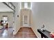 Welcoming entryway with hardwood floors, high ceilings, and natural light at 7130 Rocking Horse Ln, Cumming, GA 30040