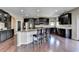 Well-appointed kitchen with stainless steel appliances and granite countertops at 7130 Rocking Horse Ln, Cumming, GA 30040
