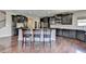 Stylish kitchen featuring stainless appliances and granite countertops at 7130 Rocking Horse Ln, Cumming, GA 30040