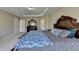 Spacious main bedroom features a tray ceiling, neutral walls, and a large decorative dresser at 7130 Rocking Horse Ln, Cumming, GA 30040