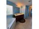 Primary bathroom featuring double sinks, a window, and a view to the shower area at 1668 Scenic Pines Dr, Lawrenceville, GA 30044