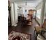 Refined dining area with chandelier, elegant table setting, decor, and natural light from large windows at 1668 Scenic Pines Dr, Lawrenceville, GA 30044