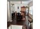 Refined dining area with chandelier, elegant table setting, decor, and natural light from large windows at 1668 Scenic Pines Dr, Lawrenceville, GA 30044