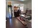 Elegant living room showcasing hardwood floors, formal dining area, decorative columns, and stylish furnishings at 1668 Scenic Pines Dr, Lawrenceville, GA 30044