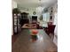 Bright living room featuring hardwood floors, recessed lighting, and an elegant chandelier at 1668 Scenic Pines Dr, Lawrenceville, GA 30044