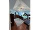 A primary bedroom boasting blue walls, a decorative ceiling fan and hardwood floors at 1668 Scenic Pines Dr, Lawrenceville, GA 30044