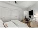 Well-appointed bedroom with modern amenities, including a work desk and a spacious closet at 200 River Vista Dr # 713, Atlanta, GA 30339