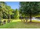 Relaxing view of outdoor seating in community space, complete with a pond and fountain at 200 River Vista Dr # 713, Atlanta, GA 30339