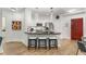 Well-equipped kitchen with stainless steel appliances, white cabinetry, and an island with seating at 200 River Vista Dr # 713, Atlanta, GA 30339