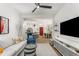 Inviting living room with an open floor plan, seamlessly connecting to the kitchen and dining area at 200 River Vista Dr # 713, Atlanta, GA 30339